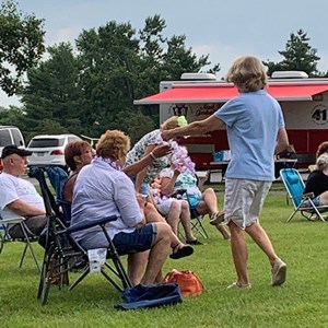 Nancy Handing Out Leis